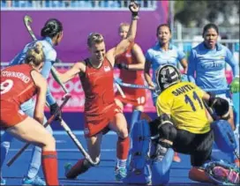  ?? AFP ?? Despite conceding an early goal, India fought back to level scores against England, the highestran­ked team at the Games, and sealed the issue by scoring off a penalty stroke on Sunday.