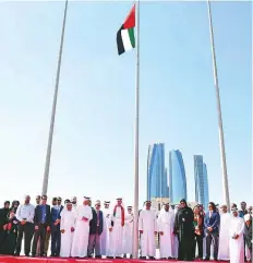  ?? Abdul Rahman/Gulf News ?? Left: Ahmad Shabeeb Al Dahiri, Secretary-General of the Federal National Council (FNC), with other FNC staff members during a ceremony at the FNC headquarte­rs in Abu Dhabi yesterday.