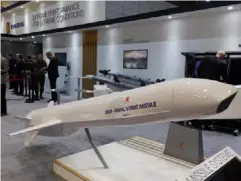  ??  ?? Weapons, vehicles and prototypes on display at the DSEI arms fair in London, 2017 (Lizzie Dearden)