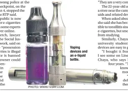  ?? PHOTO: WWW.123RF.COM ?? Vaping devices and an e-liquid bottle.