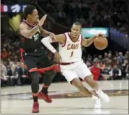  ?? ASSOCIATED PRESS FILE ?? Rodney Hood drives against the Raptors’ DeMar DeRozan last season.