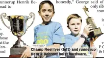  ??  ?? Champ Neel Iyer (left) and runnerup Henrik Behrent hoist hardware.