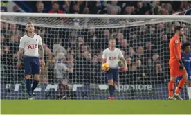  ??  ?? A dejected Kieran Trippier (left) looks to the skies after his bizarre own goal sealed Tottenham’s defeat at Chelsea. Photograph: Tom Jenkins/The Guardian