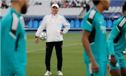  ?? Photograph: Tom Jenkins/The Guardian ?? Carlo Ancelotti watches his Real Madrid players train at the Stade de France.