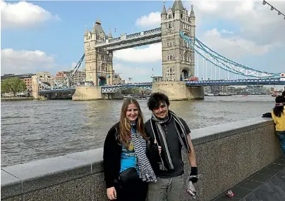  ??  ?? Katie Shepherd and her partner enjoy a walk along the Thames River.