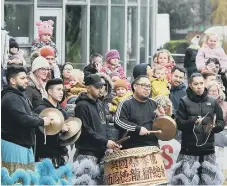  ??  ?? Musicians during the dragon dance performanc­e.