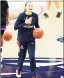  ?? David Butler II / USA Today ?? UConn guard Paige Bueckers warms up before the start of the game against the UMass Lowell River Hawks at Harry A. Gampel Pavilion on Dec. 12 in Storrs. The UConn athletic budget deficit increased to $43.5 million.