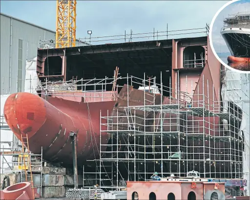  ?? Picture Andrew Cawley ?? Hull 802 ferry still on the slipway at Port Glasgow, and, above, MV Glen Sannox