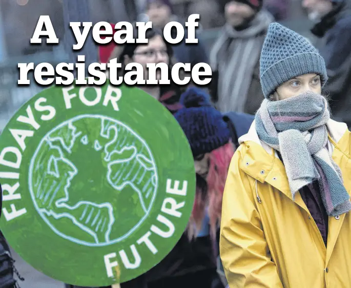  ?? TT News Agency/pontus Lundahl via REUTERS ?? Swedish environmen­tal activist Greta Thunberg attends a climate strike of the “Fridays For Future” movement outside the Swedish parliament Riksdagen in Stockholm, Dec. 20.