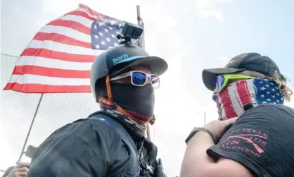  ??  ?? A protester and a Proud Boy face to face at a rally in Portland, Oregon, on 26 September. Photograph: RMV/Rex/Shuttersto­ck