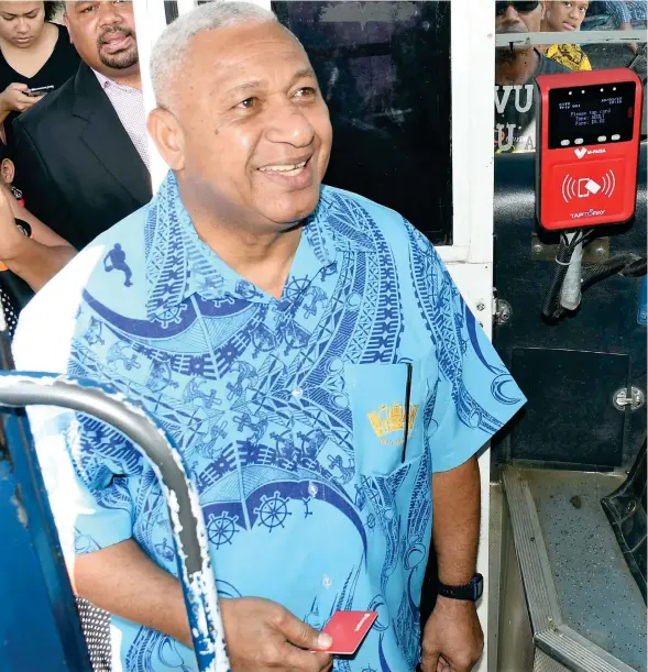  ?? Photo: Vilimoni Vaganalau ?? Prime Minister Voreqe Bainimaram­a launching the e-Transport card system for bus services at the Suva Bus Station on October 1, 2017.