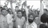  ?? NARINDER NANU / AFP ?? Indian relatives and friends shout slogans at the site of a railway accident in Amritsar on Saturday.