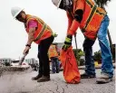  ?? Yi-Chin Lee/Staff file photo ?? Constructi­on crews work in the 3800 block of Westheimer on May 7. The project will improve bus stops and repair pavement on a 6-mile stretch from Loop 610 to downtown.