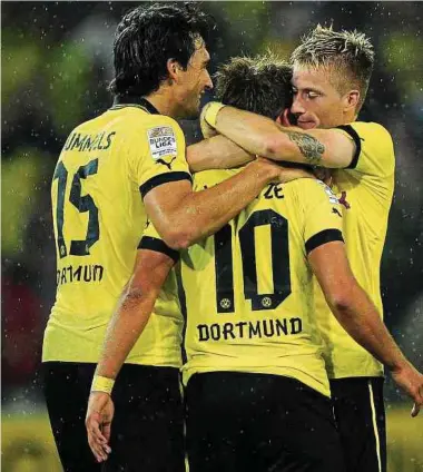  ?? Fotos: dpa ?? Wieder vereint in Dortmund: Mats Hummels, Mario Götze und Marco Reus (v.l.n.r.).