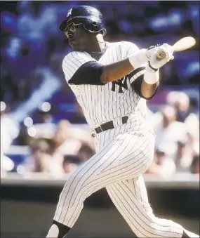  ?? Focus On Sport / Getty Images ?? Yankees first baseman Bob Watson bats at Yankee Stadium in the early 1980s. Watson went on to become the team’s GM, and was the first black GM to win a World Series, leading the team to the 1996 championsh­ip. Watson died Friday at 74.