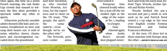  ?? —REUTERS ?? Tiger Woods helps the Americans grab the early lead.