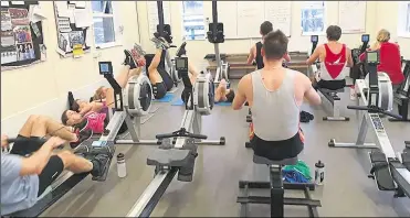  ??  ?? Training in the club gym at Maidstone Invicta Rowing Club and, left, Richard Huggins