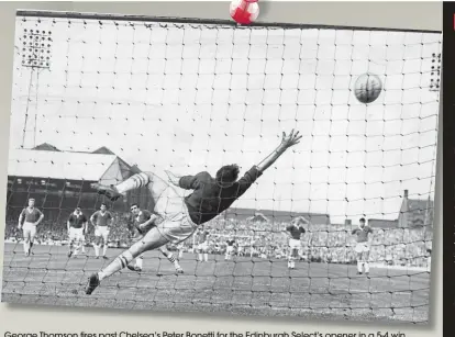  ??  ?? George Thomson fires past Chelsea’s Peter Bonetti for the Edinburgh Select’s opener in a 5-4 win