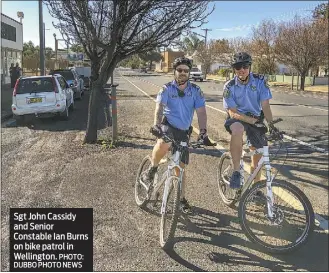  ?? DUBBO PHOTO NEWS ?? Sgt John Cassidy and Senior Constable Ian Burns on bike patrol in Wellington. PHOTO: