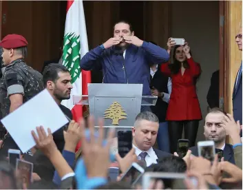  ??  ?? Saad Hariri a appelé à éloigner le Liban des conflits au Moyen-Orient et à adopter une « politique de distanciat­ion », hier, lors d’une brève allocution télévisée à Beyrouth.