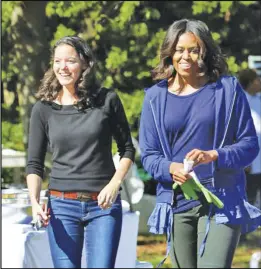  ??  ?? Deb Eschmeyer with former First Lady Michelle Obama; both help support improving nutrition for families.