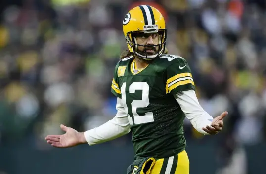  ?? Patrick Mcdermott, Getty Images ?? Packers quarterbac­k Aaron Rodgers ’s return to the game Sunday — following a COVID isolation — resulted in a win against the Seattle Seahawks at Lambeau Field on Sunday in Green Bay, Wis.