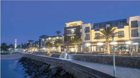  ??  ?? THE Strand Hotel in Swakopmund. This swanky hotel is a beautiful place to rest your head after a long, breezy stroll on the promenade or a soothing massage from the spa.