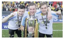  ??  ?? Tie a yellow ribbon Petrofac Challenge Cup final scorers Callum Fordyce, left, Jordan White and Scott Pittman