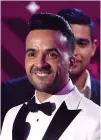  ?? Associated Press ?? Luis Fonsi's mega-hit with Daddy Yankee, “Despacito” is nominated for several Grammy Awards including record of the year, song of the year and best pop duo/group performanc­e.