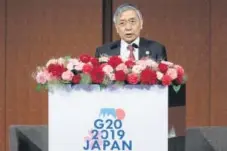  ?? Kiyoshi Ota, Pool, Bloomberg ?? Bank of Japan Governor Haruhiko Kuroda speaks at the Group of 20 high-level seminar on financial innovation, “Our Future in the Digital Age,” on the sidelines of the G20 finance ministers and central bank governors meeting in Fukuoka, Japan, on Saturday.