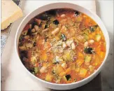  ?? CARL TREMBLAY THE ASSOCIATED PRESS ?? This minestrone marries a flavourful tomato broth with fresh vegetables, beans and pasta.