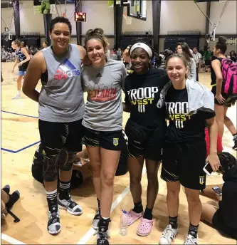  ?? Photo courtesy Denise Ballard ?? From left, Troop West and Valencia girls basketball players Skylar Ingram, Mailey Ballard, Jasmine Glover and Marissa Howell competed in the Adidas Gauntlet Championsh­ips in Atlanta this week.