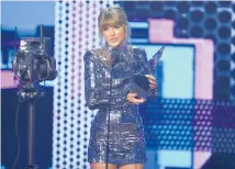  ?? Photo / AP ?? Taylor Swift also used her acceptance speech at the American Music Awards this week to encourage people to vote.