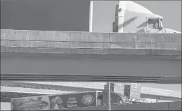  ?? MARK MIRKO/HARTFORD COURANT ?? Trucks travel ramps merge Route 8 and I95 in Bridgeport, along one of seven “choke points” in Connecticu­t identified in a national report.