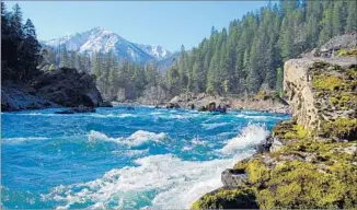  ?? Erik Meldrum Momentum River Expedition­s ?? IN OREGON’S Illinois River, seen last March near Klondike Peak, whitewater season may linger.