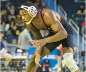  ?? SAMMY NANCE / INDIANA ATHLETICS ?? Indiana’s Donnell Washington wrestles in the Big Ten Tournament on Saturday. Washington, a 2019 Portage graduate, will make his third appearance at the NCAA Tournament after recovering from surgery on his left leg.