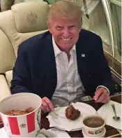  ??  ?? Overweight: Mr Trump with a KFC meal