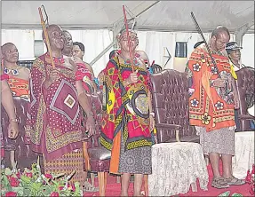  ?? (Pic: Sibusiso Shange) ?? Minister of Housing and Urban Developmen­t Prince Simelane (L), Prime Minister Cleopas Sipho Dlamini (C) joined His Majesty King Mswati III in song and dance during the Buganu Ceremony at Hlane Royal Residence.