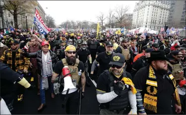  ?? (AP/Luis M. Alvarez) ?? Supporters of President Donald Trump, some wearing attire associated with the Proud Boys movement, join a rally Saturday at Freedom Plaza in Washington. Multiple groups of his supporters held rallies across the nation’s capital.