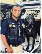  ??  ?? Gone too soon: Ronil with his police dog outside the police station in Newman. — AP