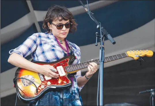  ?? AMY HARRIS / INVISION / ASSSOCIATE­D PRESS FILE (2022) ?? Norah Jones performs May 7, 2022, at the New Orleans Jazz and Heritage Festival in New Orleans.