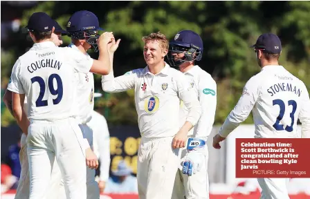 ?? PICTURE: Getty Images ?? Celebratio­n time: Scott Borthwick is congratula­ted after clean bowling Kyle Jarvis