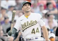  ?? DAVID ZALUBOWSKI — THE ASSOCIATED PRESS ?? The A’s Matt Olson watches his ball take flight during the first round of the Home Run Derby on Monday night in Denver.