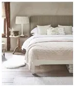  ??  ?? LEFT A neutral headboard in a simple shape provides comfort without distractin­g from delicately coloured and textured bed covers. ‘Olivia’ double headboard, from £ 570, Neptune RIGHT Tailored yet easy to clean, a loose covered headboard is a practical...