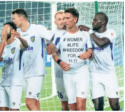  ?? FSDL ?? Making a
statement: Vafa Hakhamanes­hi (second right) celebrates with his team-mates after scoring against East Bengal. “I was only thinking about the celebratio­n.
For two weeks, I was waiting day and night for the moment: to score and get this message out. After I scored the goal, I forgot everything and only wanted to show the message,” the 31 year old said.