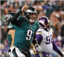  ?? Abbie Parr / Getty Images ?? Eagles quarterbac­k Nick Foles was magnificen­t Sunday, completing 26 of 33 passes for 352 yards and three touchdowns, with no intercepti­ons.