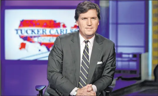  ?? Richard Drew The Associated Press ?? Tucker Carlson and other Fox bigwigs didn’t buy Donald Trump’s allegation­s about the 2020 presidenti­al election.