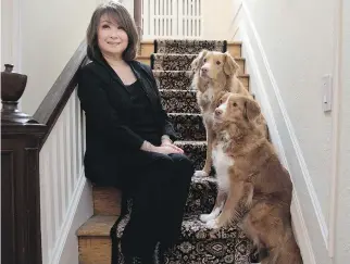  ?? ALLEN McINNIS ?? CTV Montreal anchor Mutsumi Takahashi at home with her dogs, Koffman and Billycakes. She says, “I don’t like being the news. An interestin­g title does not necessaril­y make for an interestin­g person.”