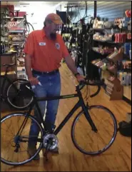  ?? John Talcott ?? Bret with his newly repaird bike.