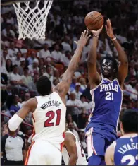  ?? AP/LYNNE SLADKY ?? Joel Embiid and the Philadelph­ia 76ers get to learn what a 76er-Boston Celtics playoff rivalry is like. The rivalry dates back to the 1960s when the two teams were headlined by Bill Russell and Wilt Chamberlai­n, and it continued into the 1980s with...